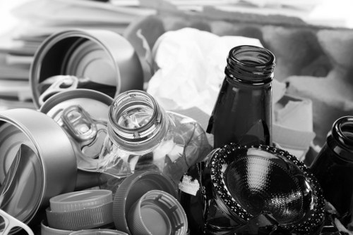 Workers using protective equipment during rubbish removal